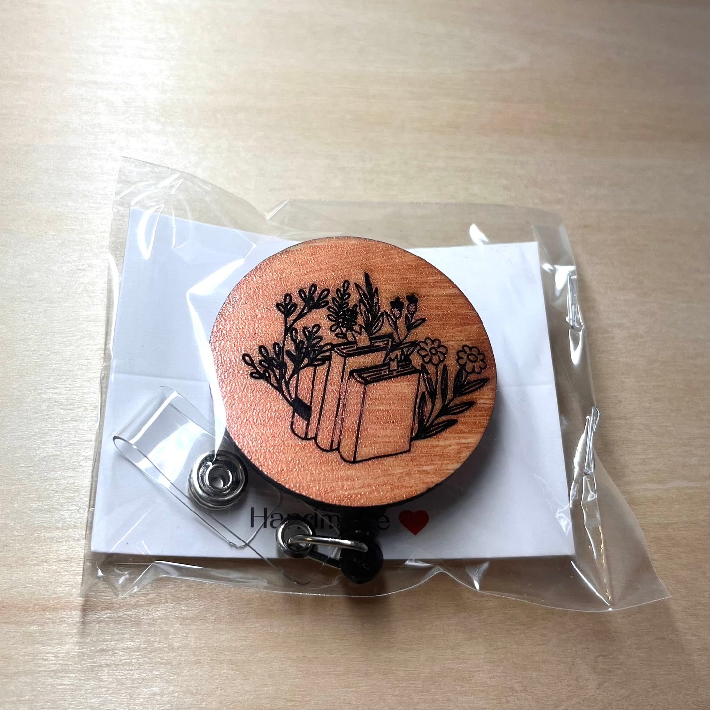 Floral Book Stack Badge Reel