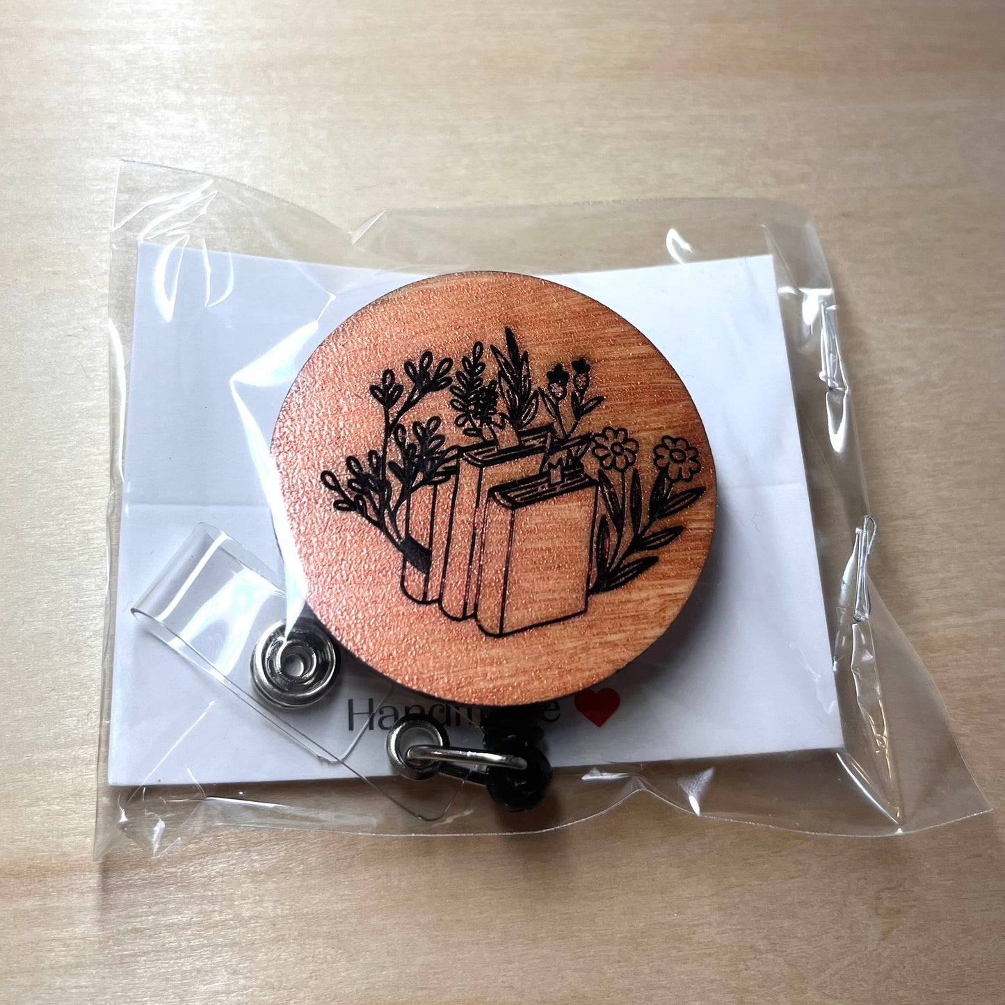 Floral Book Stack Badge Reel
