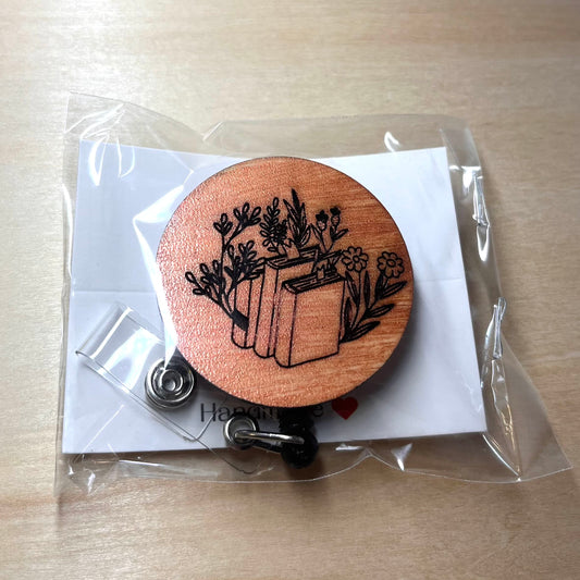 Floral Book Stack Badge Reel