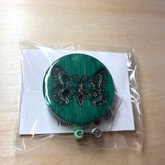 Moth Badge Reel