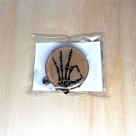 Skeleton Hand OK Badge Reel
