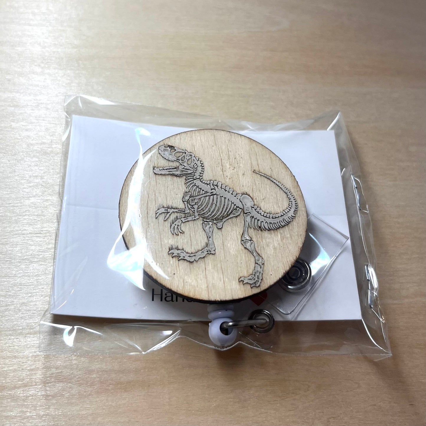 Skeletal T-Rex Badge Reel